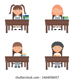 cute little students group in the schooldesks