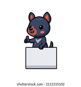 Cute little tasmanian devil cartoon with blank sign and giving thumb up
