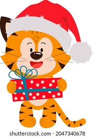 A cute little tiger cub is standing in a hat with a gift. A greeting card with the year of the tiger. Happy New Year and Merry Christmas. The new year is 2022.