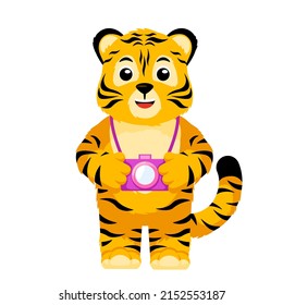 Cute little Tiger photographer character isolated. Happy cub cartoon striped tiger with camera. Vector design for print, children decor, book illustration. Funny animal sticker for showing emotion.