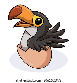 Cute little toucan cartoon hatching from egg