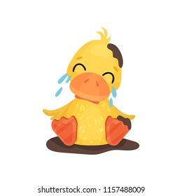 Cute little yellow duckling character sitting in a mud puddle and crying vector Illustration on a white background