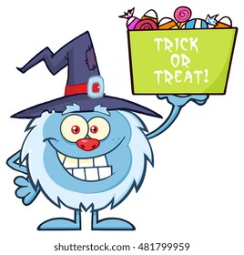 Cute Little Yeti Cartoon Mascot Character With Witch Hat Holding Up A Trick Or Treat Halloween Candy Basket. Vector Illustration Isolated On White Background