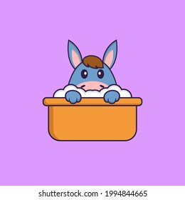 Cute llama taking a bath in the bathtub. Animal cartoon concept isolated. Can used for t-shirt, greeting card, invitation card or mascot.