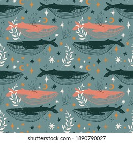Cute magical boho whales seamless pattern design.