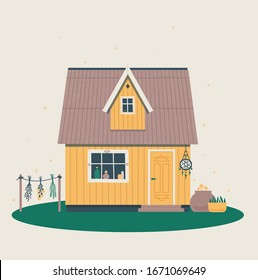 Cute magical witch house with attic window. Mysterious atmosphere and place of strength. Vector illustration of a fabulous building, dry herbs and magic symbols.