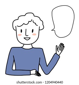 Cute man in casual outfit speaking and using hand gesture pointing to the blank speech balloon. Male presenter talking and presenting something. Portrait of young man speaking and pointing.