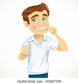 Cute man with a glass of water brushing his teeth isolated on white background