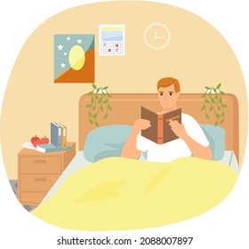 Cute man in pajamas reading literature on his bed comfortably. Book lover concept with young man lying relax on sofa and reading book. Concept of homeward and comfort. Person relaxes after work