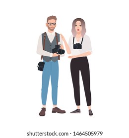 Cute man and surprised woman photographers isolated on white background. Pair of funny photo journalists with professional equipment standing together. Flat cartoon colorful vector illustration.