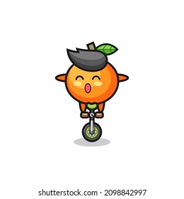 The cute mandarin orange character is riding a circus bike , cute style design for t shirt, sticker, logo element