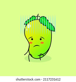 cute mango character with hopeless expression and sit down. green and orange. suitable for emoticon, logo, mascot and icon