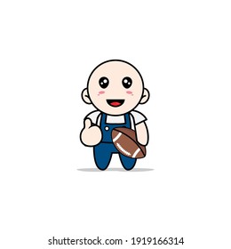 Cute mechanic character holding a rugby ball. Mascot design concept