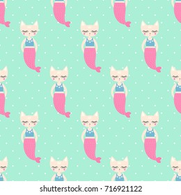 Cute mermaid cat seamless pattern on mint green polka dots background. Vector sea background for kids. Child drawing style cartoon underwater illustration. Design for fabric, textile, decor.