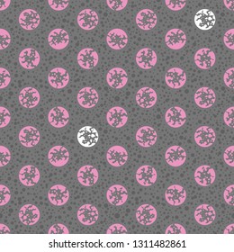 Cute minimalistic pattern of light pink and white grey polka dots. Modern dotted seamless pattern. Grey background. Vector drawing repeat pattern of dots. Wallpaper style. Textile design.