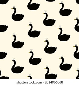 Cute minimalistic seamless pattern with black swans with crowns. Kids fashion design for fabric or wallpaper.