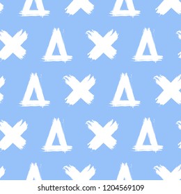 Cute minimalistic seamless pattern with white crosses and triangles on blue background. Rough brush painted vector backdrop. Ink grunge texture. 