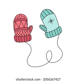 Cute mittens in cartoon style. Blue and pink mittens isolated on white background. Vector illustration