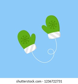 Cute mittens vector illustration icon. Winter, christmas, seasonal, knitted gloves, green and white mitten with snowflake on string.