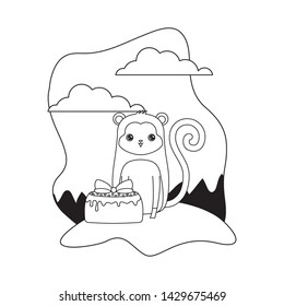 cute monkey animal with cake of birthday in landscape