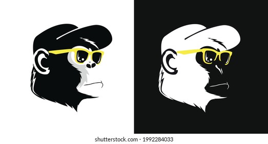 Cute monkey logo in a black and white background, vector illustration logo design.