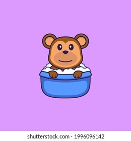 Cute monkey taking a bath in the bathtub. Animal cartoon concept isolated. Can used for t-shirt, greeting card, invitation card or mascot.