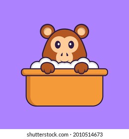 Cute monkey taking a bath in the bathtub. Animal cartoon concept isolated. Can used for t-shirt, greeting card, invitation card or mascot.