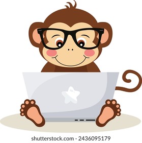 Cute monkey working with laptop