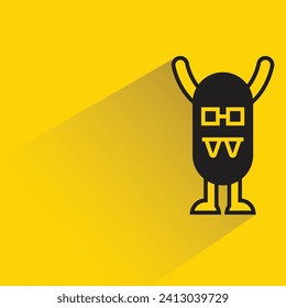personaje monstruo adorable con sombra sobre fondo amarillo