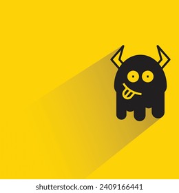 cute monster icon with shadow on yellow background