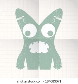 Cute monster on folded paper