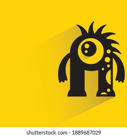 cute monster with shadow on yellow background