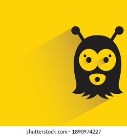 cute monster with shadow on yellow background