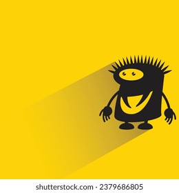 monstruo lindo con sombra en el fondo amarillo