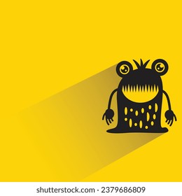 monstruo lindo con sombra en el fondo amarillo