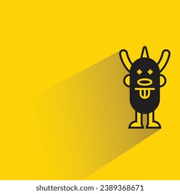 cute monster with shadow on yellow background