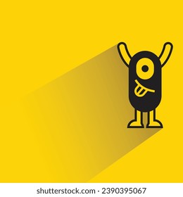 monstruo lindo con sombra en el fondo amarillo