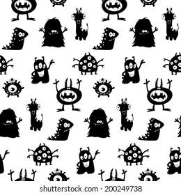 Cute monsters silhouettes seamless pattern