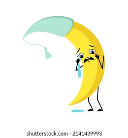 Cute moon character in nightcap with crying and tears emotion, sad face, depressive eyes, arms and legs. Person with melancholy expression and pose. Vector flat illustration