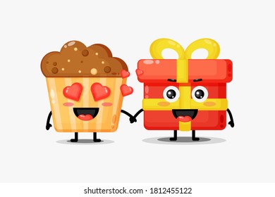 Cute muffins and gift boxes mascot holding hands