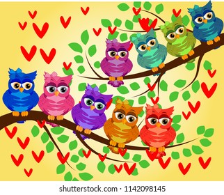 Cute multi-colored owls on a branch of a tree. Spring, summer, holiday