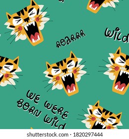 Cute muzzles of a roaring tiger and hand lettering We were born wild seamless pattern for textile, fabric, coverage, wrapping paper and other print and design. Hand-drawn vector isolated illustration.