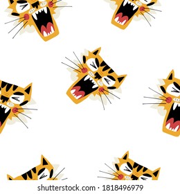 Cute muzzles of a roaring tiger seamless pattern for textile, fabric, coverage, wrapping paper and other print and design. Hand-drawn vector isolated illustration.