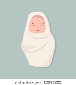 Cute newborn baby smile wrapped in cloth