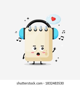 Cute note mascot listening to music