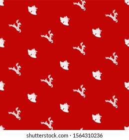 Cute objects symbolizing the New Year on red background. Seamless pattern.