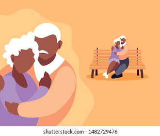 cute old couple seated in chair of park and hugged