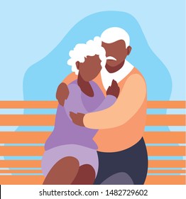 cute old couple seated in chair of park
