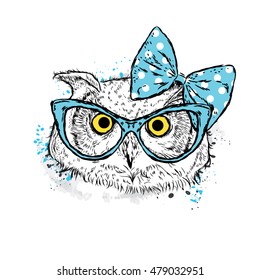 Cute owl with bow and glasses. Vector illustration drawn by hand. Postcard or poster. Print on clothes. Beautiful bird.