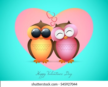 Cute Owl Couple in love on big heart decorated background for Happy Valentine's Day celebration.